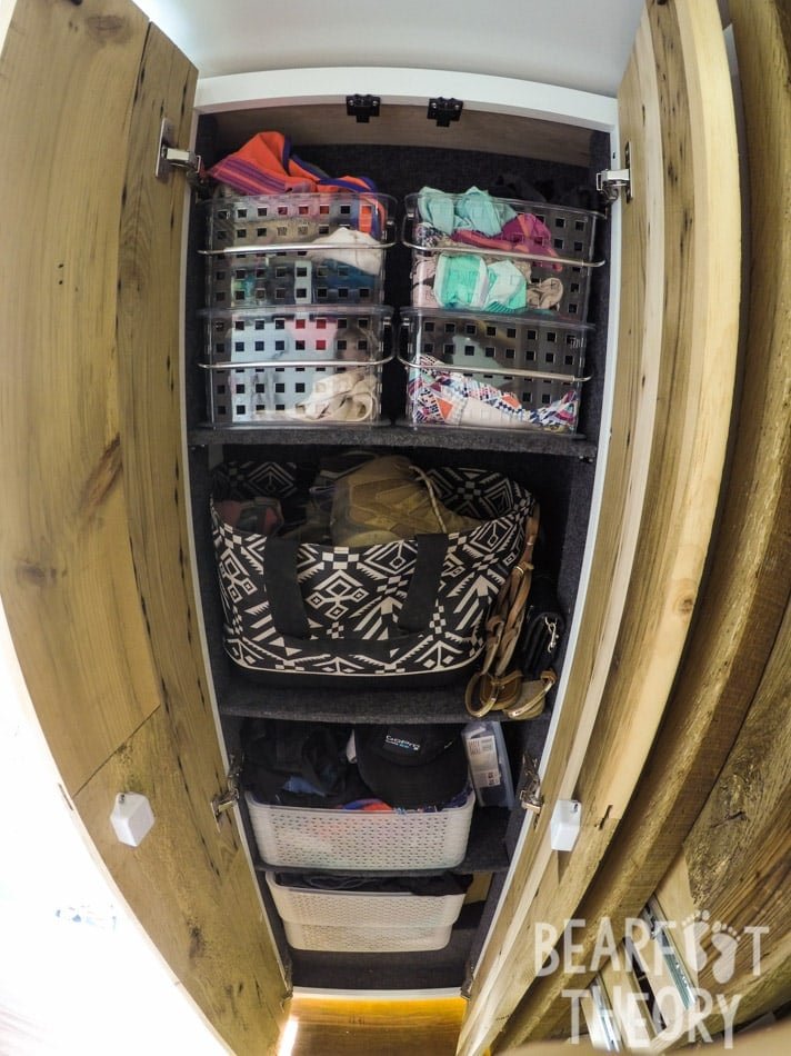 Large floor to cieling cabinet for clothing and gear storage in Alaina's first 4x4 Mercedes Sprinter Van