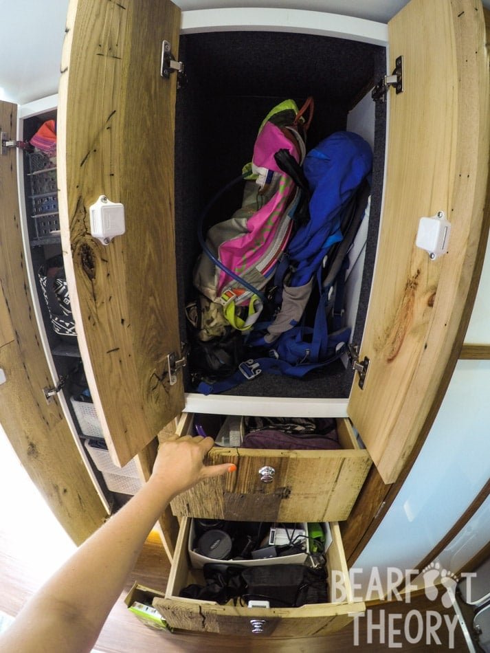 Large floor to cieling cabinet for clothing and gear storage in Alaina's first 4x4 Mercedes Sprinter Van