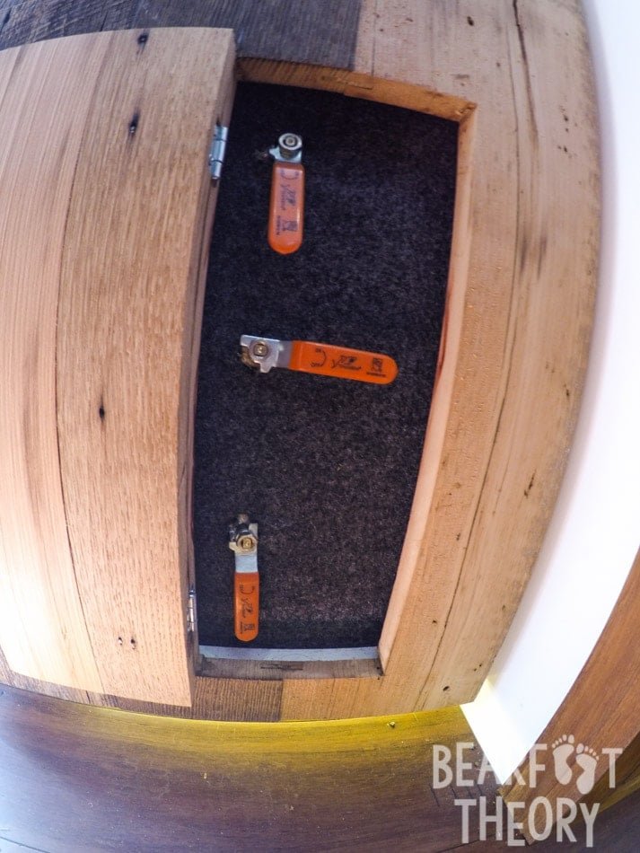 Water tanks and control valves in Alaina's first Sprinter Van Conversion
