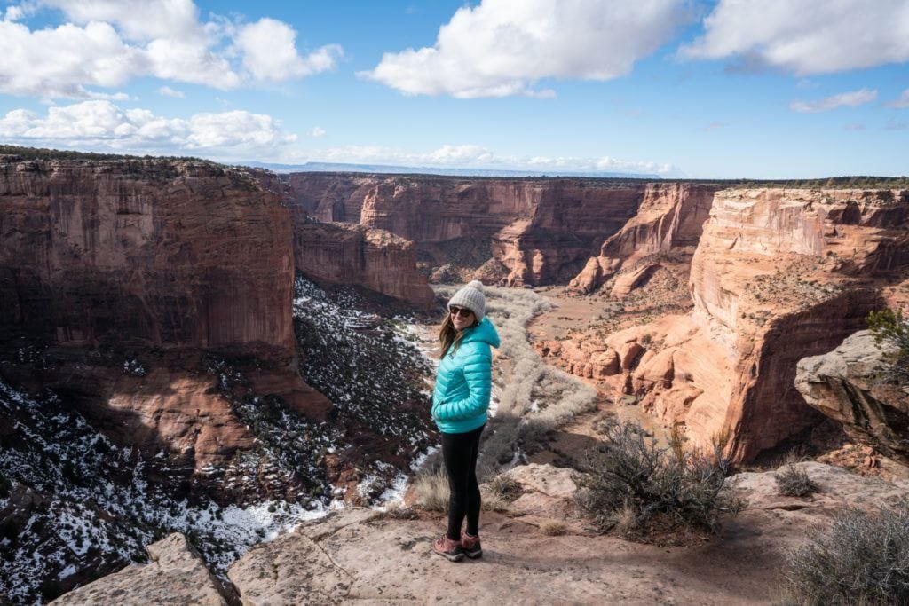Terrain Spark founder Alaina Hermiston standing on the rim of Canyon De Chelley in Arizona