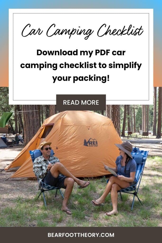 Two people sitting in camp chairs outside of an orange REI tent with text that says "Car Camping Checklist" and "Download my PDF car camping checklist to simplify your packing"