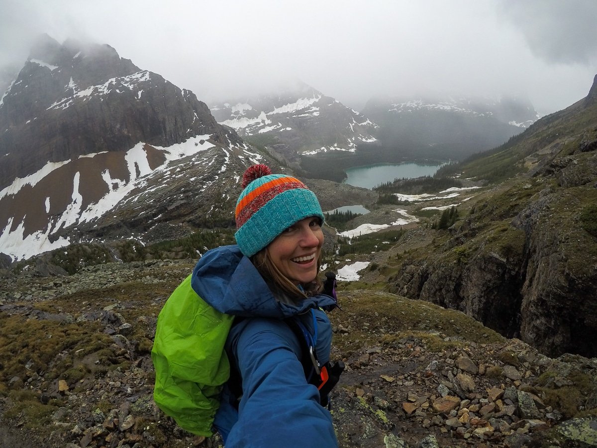 Terrain Spark founder Alaina Hermiston hiking on a foggy rainy day at Lake O'Hara.