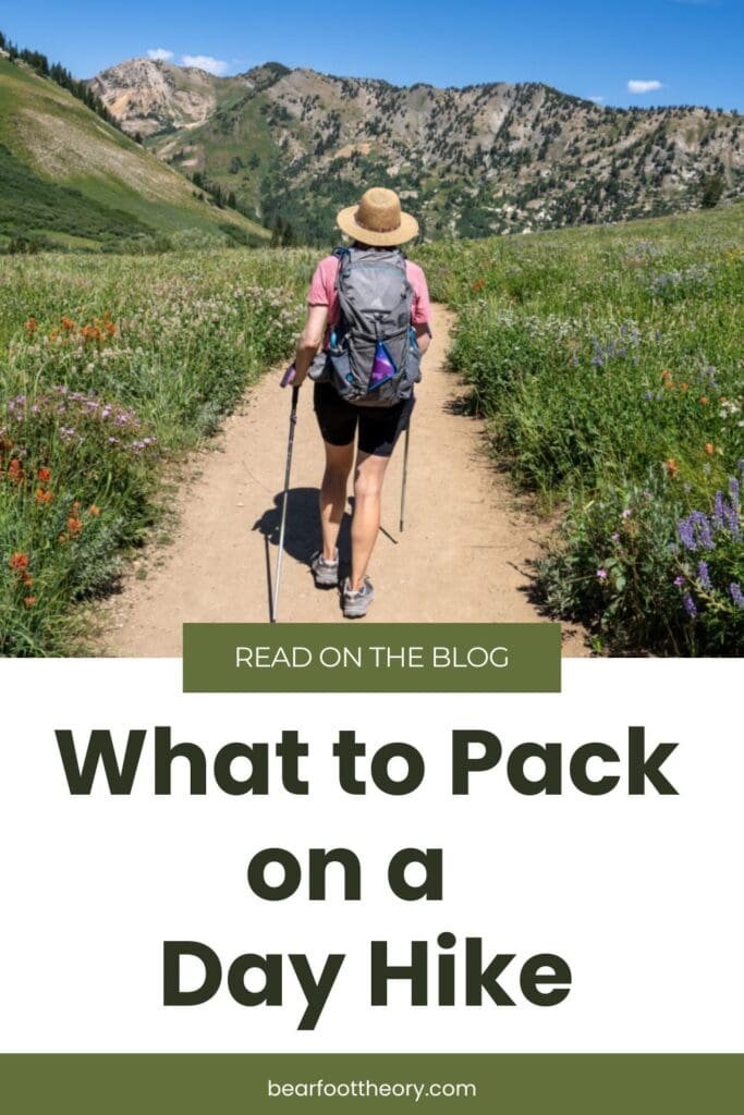 Alaina Hermiston hiking at Alta Ski area in summer with a gray backpack on. Text reads What to Pack on a day hike