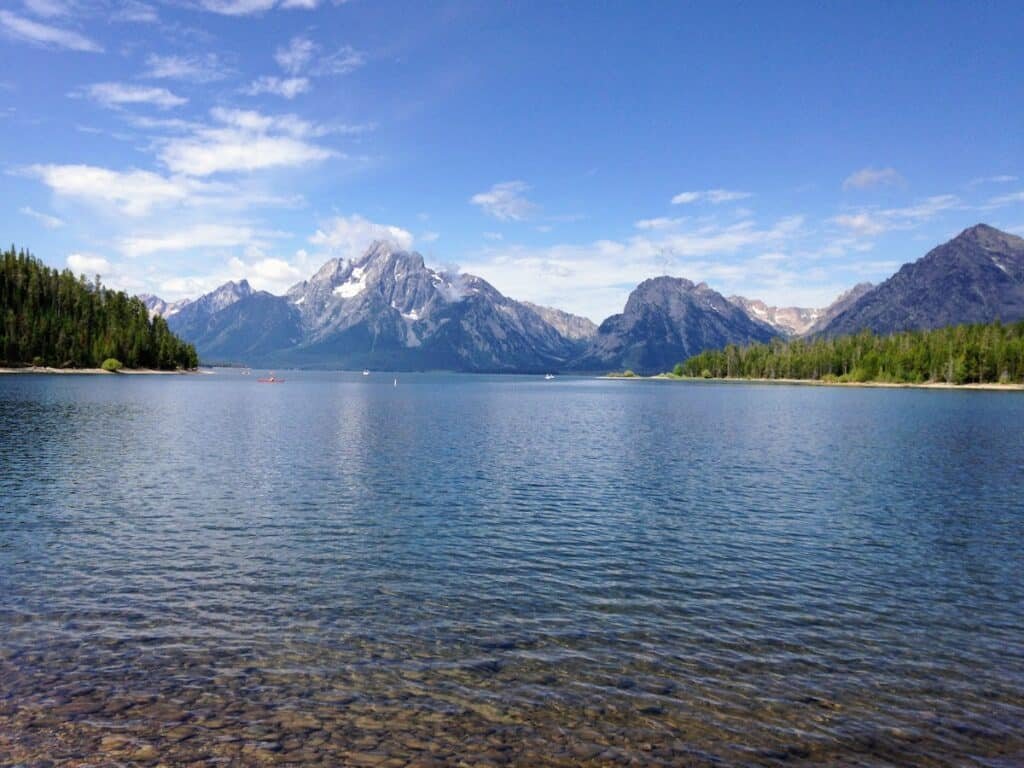 Jenny Lake in Grand Teton National Park with mountains in distance