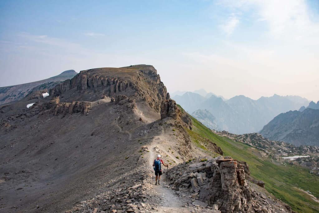 Backpacker hiking on the Teton Crest Trail in Wyoming