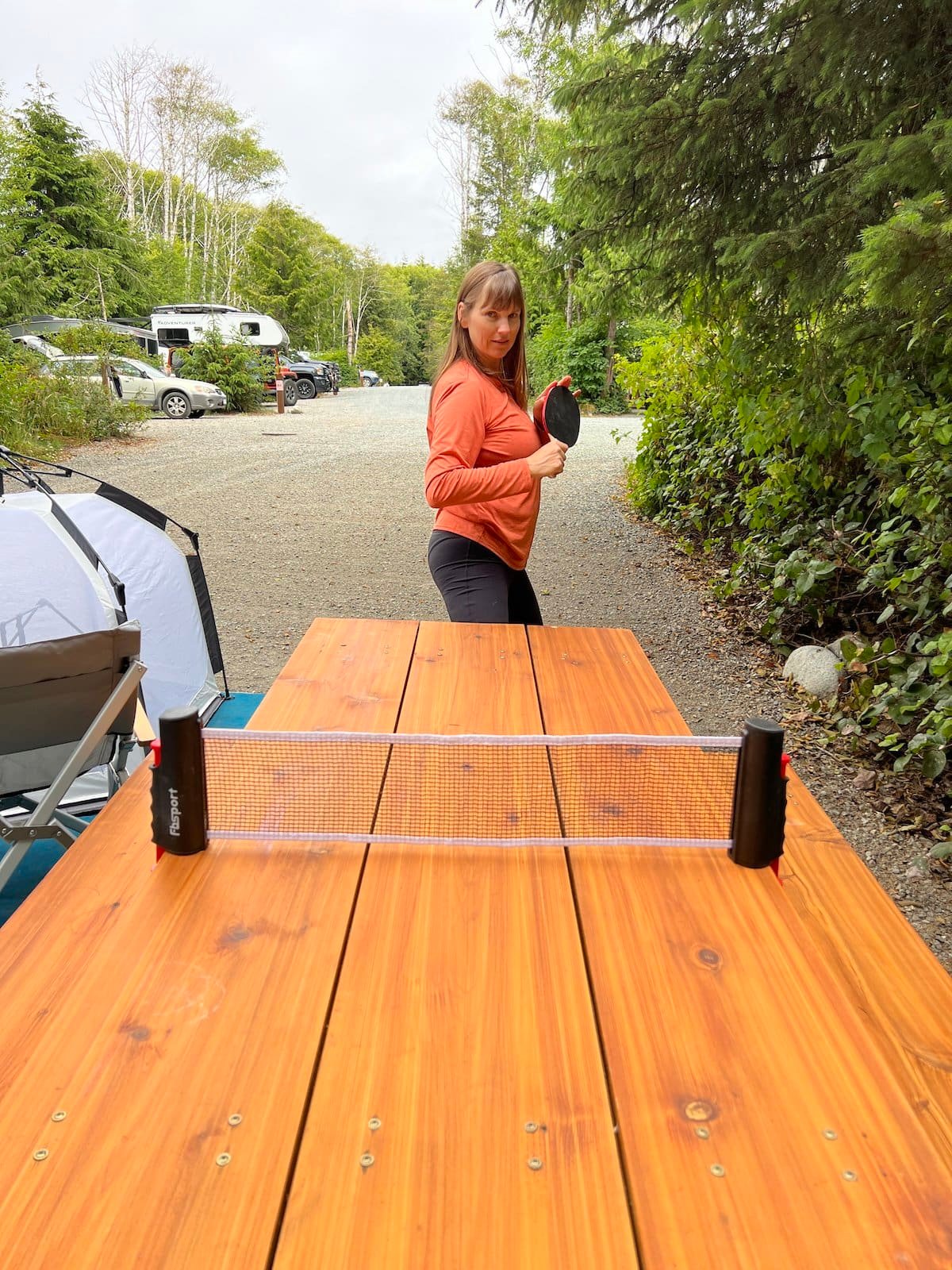 Alaina Hermiston playing table top ping pong