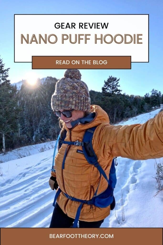 Pinnable image of woman taking selfie wearing Patagonia Nanopuff Hoodies while on a winter hike. Text reads "Gear review: Nano Puff Hoodie"