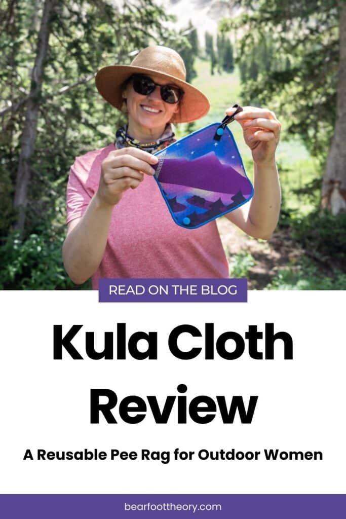 Alaina Hermiston holding Kula Cloth pee rag featuring a bear next to a lake with a cosmic mountain scene. Text reads Kula Cloth Review. A reusable pee rag for outdoor women
