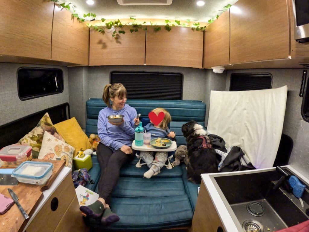 Alaina Hermiston and her son sitting on the second bed in the Rossmonster Baja Trail LX